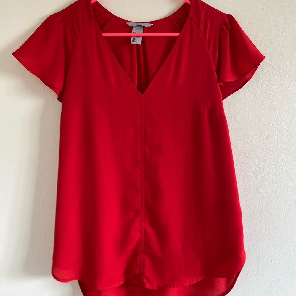 Bright red blouse